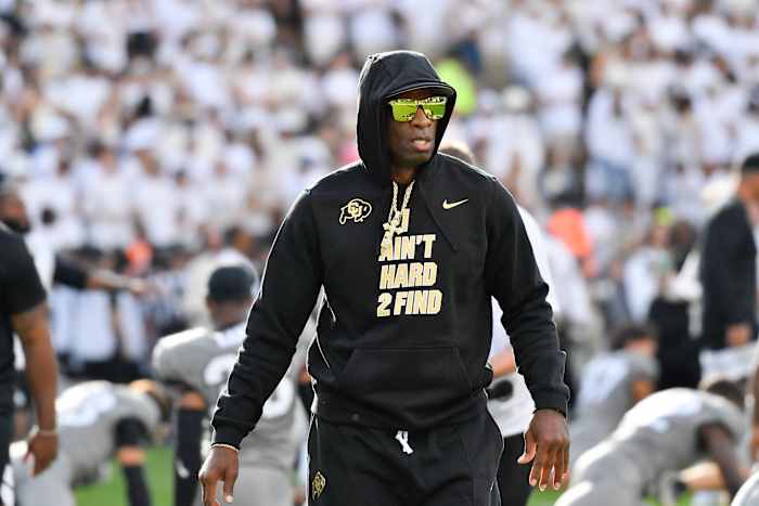  Colorado Buffaloes head coach Deion Sanders walks the field during game agains the USC Trojans at Folsom Field